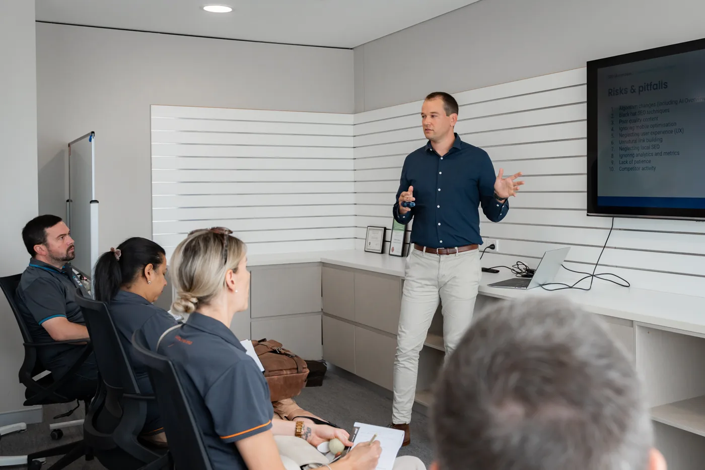 Brad Russell running an SEO training session on ranking risks and pitfalls